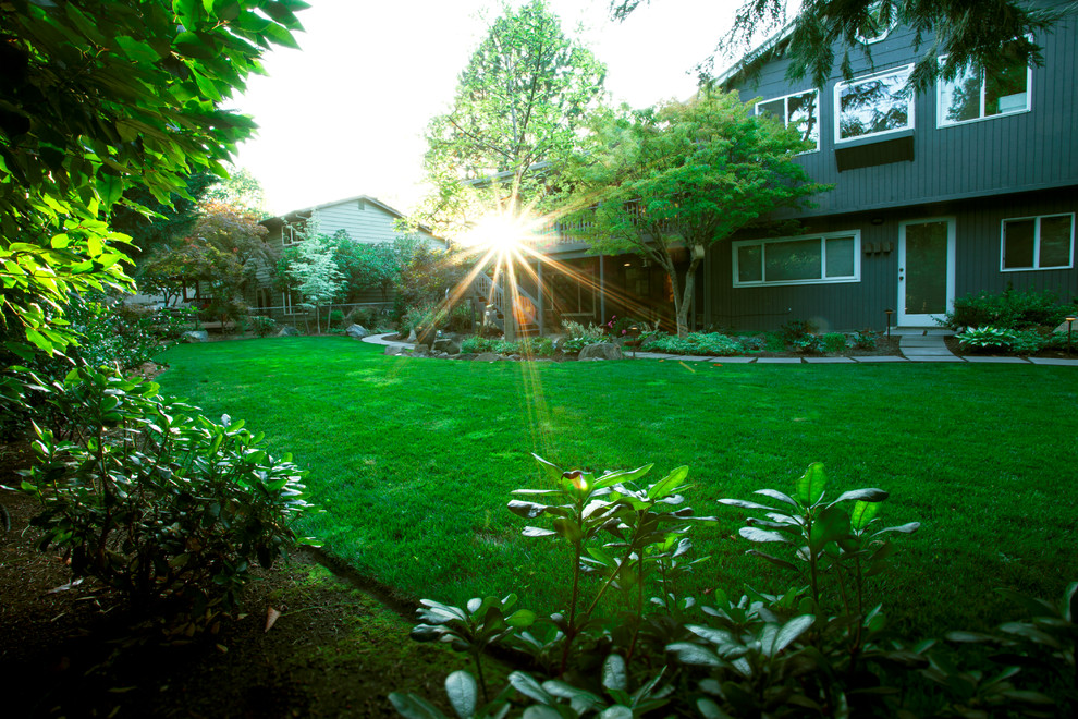 Design ideas for a medium sized retro back full sun garden for summer in Portland with concrete paving.