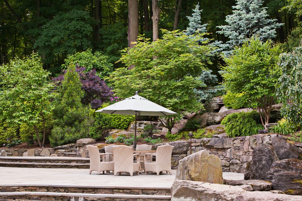 Inspiration for a traditional hillside landscaping in New York.