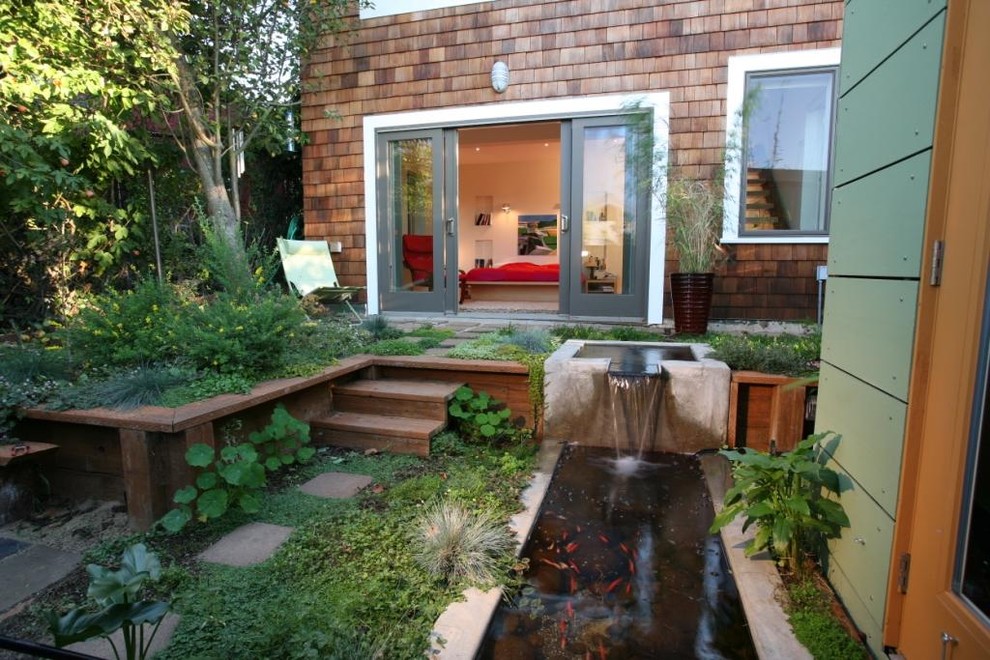 Design ideas for a contemporary garden in San Francisco with a water feature.