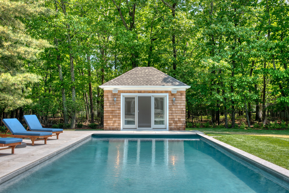 Ispirazione per una grande piscina minimalista dietro casa