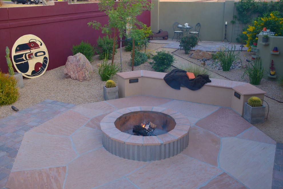 Small eclectic backyard concrete paver patio kitchen photo in Phoenix