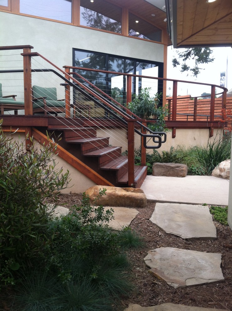 This is an example of a small contemporary courtyard fully shaded garden in San Diego with natural stone paving.