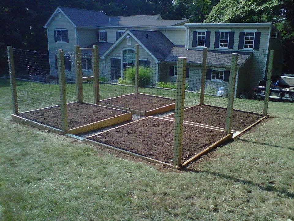 Enclosed Vegetable Garden with Raised Beds Farmhouse Landscape