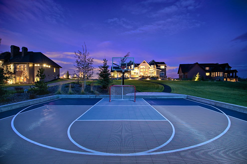 Photo of a medium sized traditional back full sun garden in Calgary with an outdoor sport court.