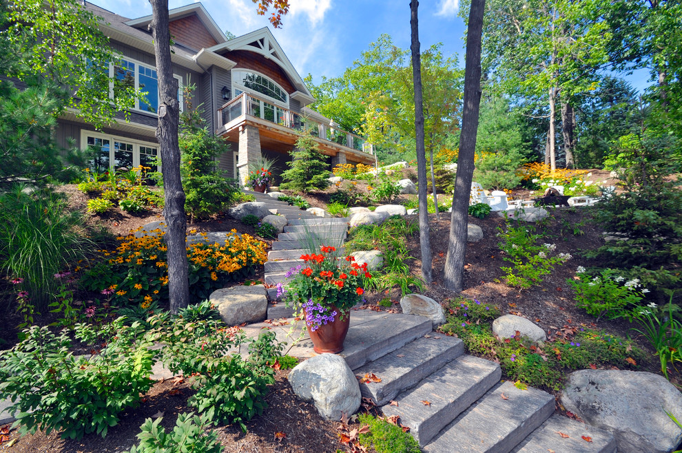 Inspiration for a rustic hillside garden path in Toronto for summer.