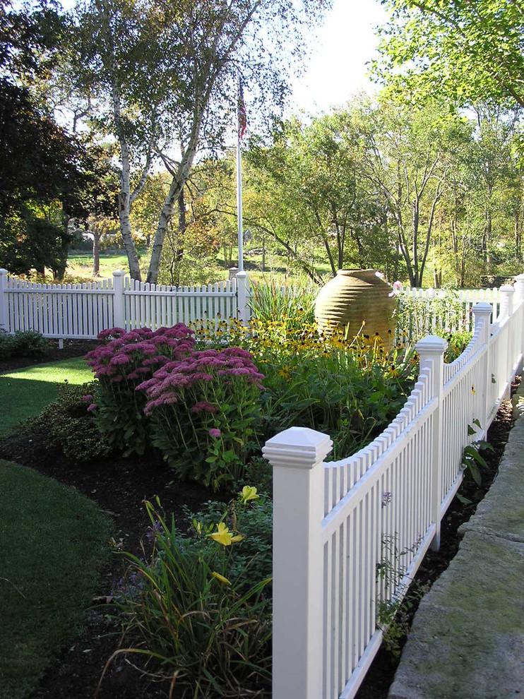 Classic front partial sun garden fence in Manchester.