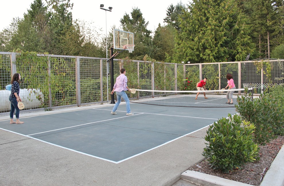 Design ideas for a rural full sun garden in Seattle with an outdoor sport court.