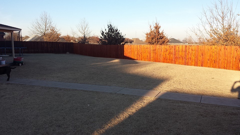 Inspiration for a craftsman full sun backyard mulch landscaping in Oklahoma City.