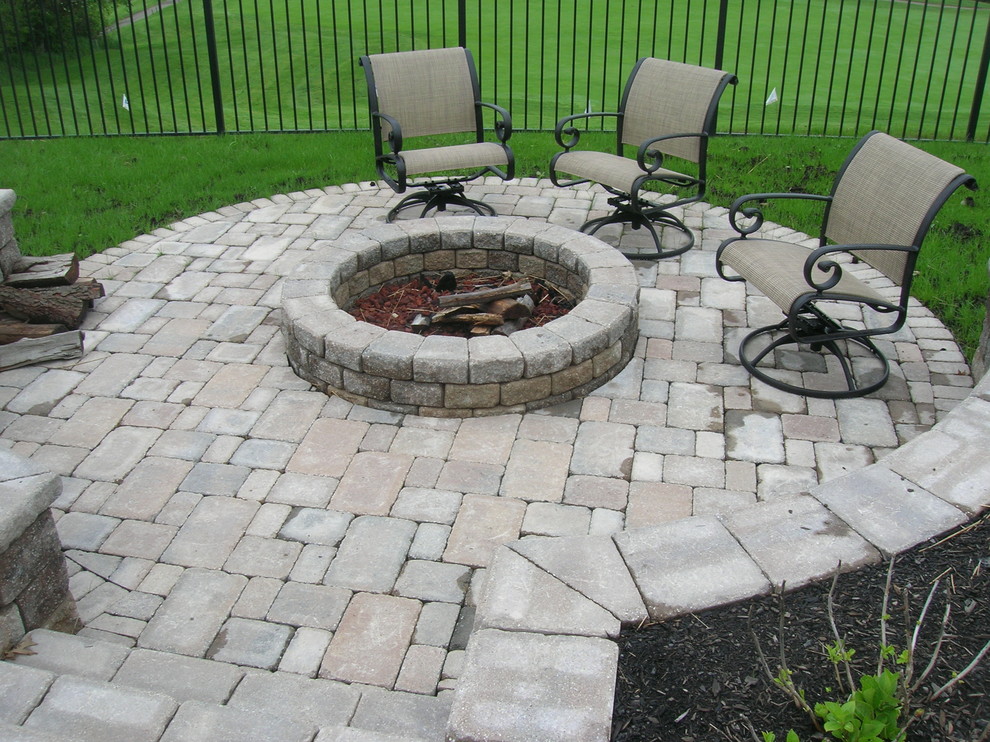 Patio - mid-sized transitional backyard concrete paver patio idea in Other with a fire pit