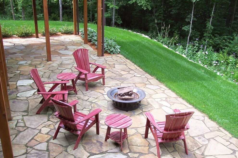 Flagstone patio Rustic Patio Minneapolis by Landsburg Landscape