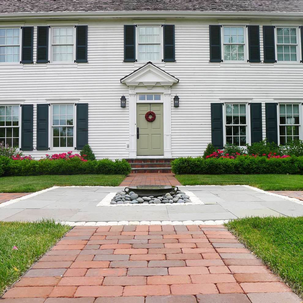 Formal Front Entry Fountain with Red Clay Pavers Traditional