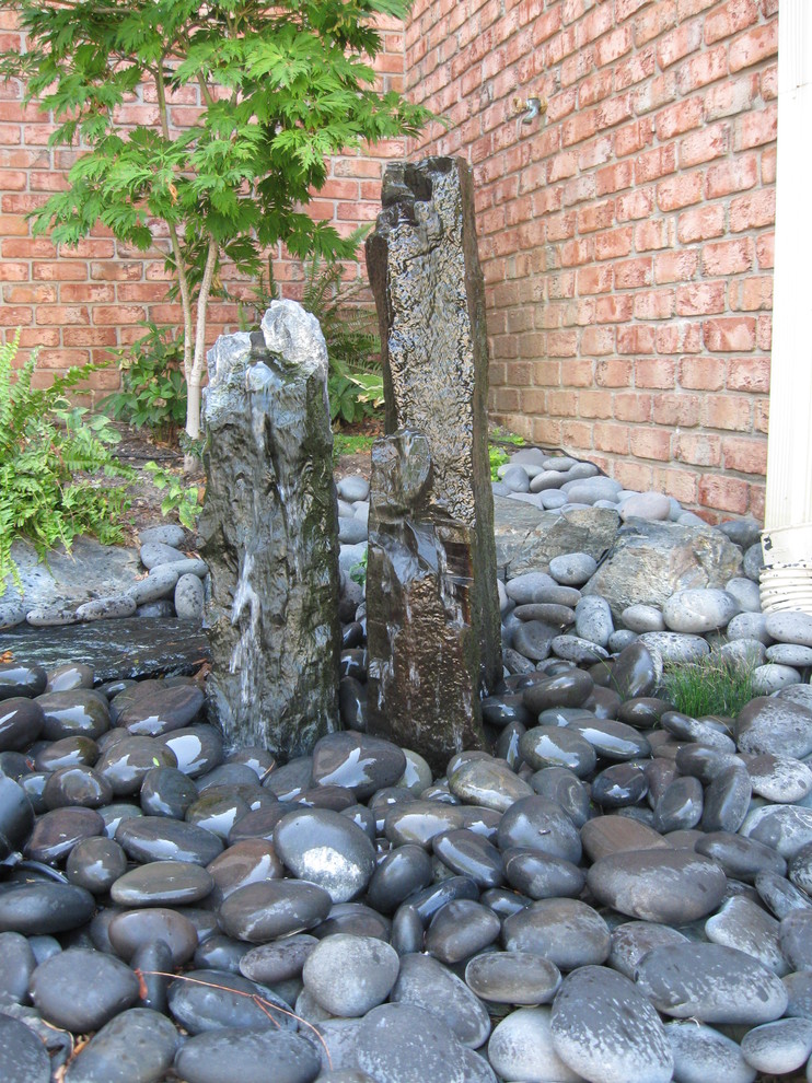 Fountainscapes Bubbling Boulder, Spilling Urns, and Other