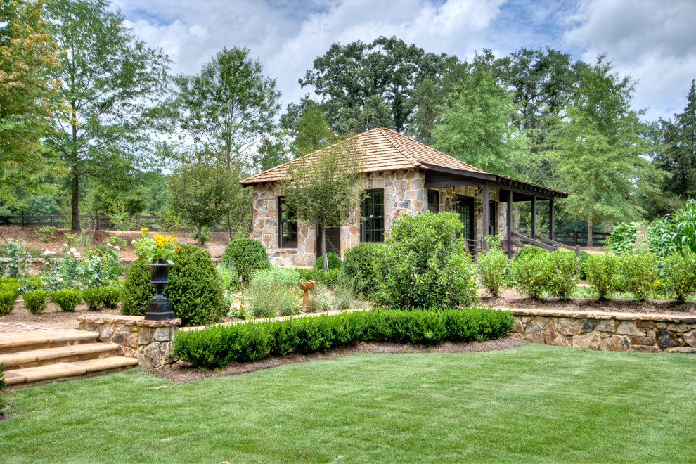 Design ideas for a farmhouse backyard landscaping in Atlanta.