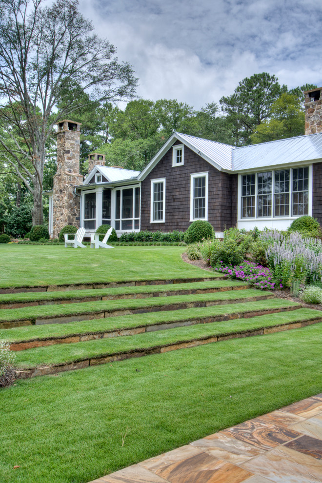 Inspiration for a farmhouse hillside landscaping in Atlanta.
