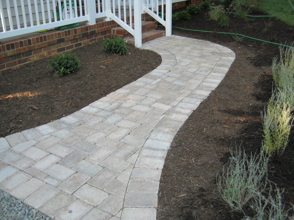 Design ideas for a small traditional front yard concrete paver garden path in Richmond.