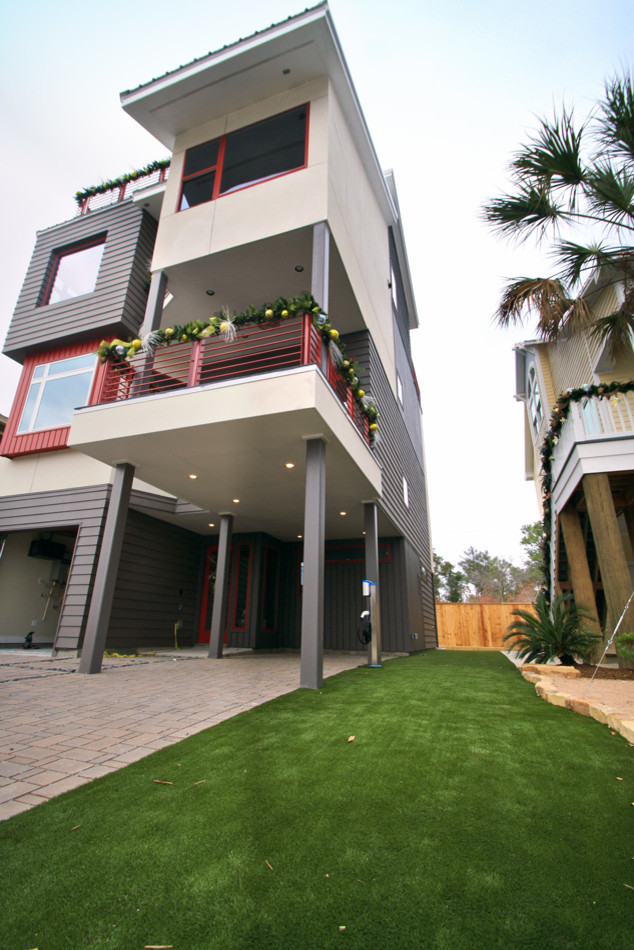 Idee per un piccolo giardino minimalista davanti casa in inverno con pavimentazioni in mattoni