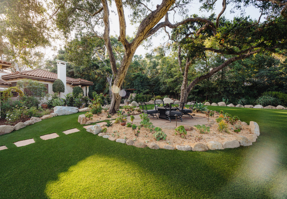 Design ideas for a mediterranean drought-tolerant and partial sun front yard lawn edging in Santa Barbara.