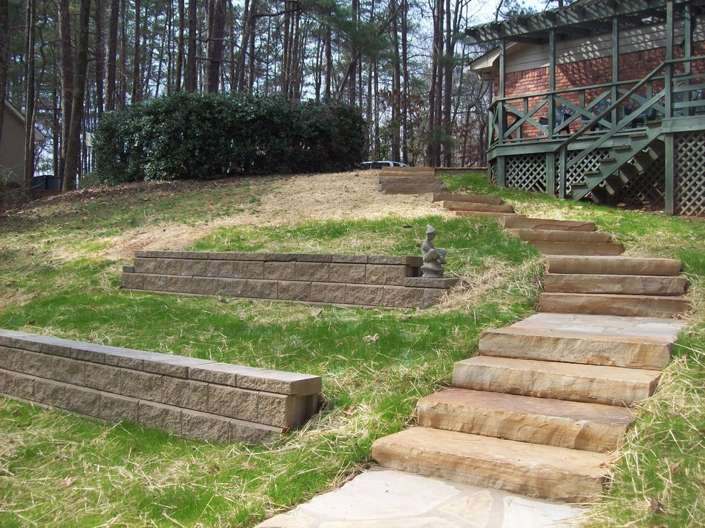Design ideas for a large traditional sloped full sun garden in Atlanta with a garden path and natural stone paving.