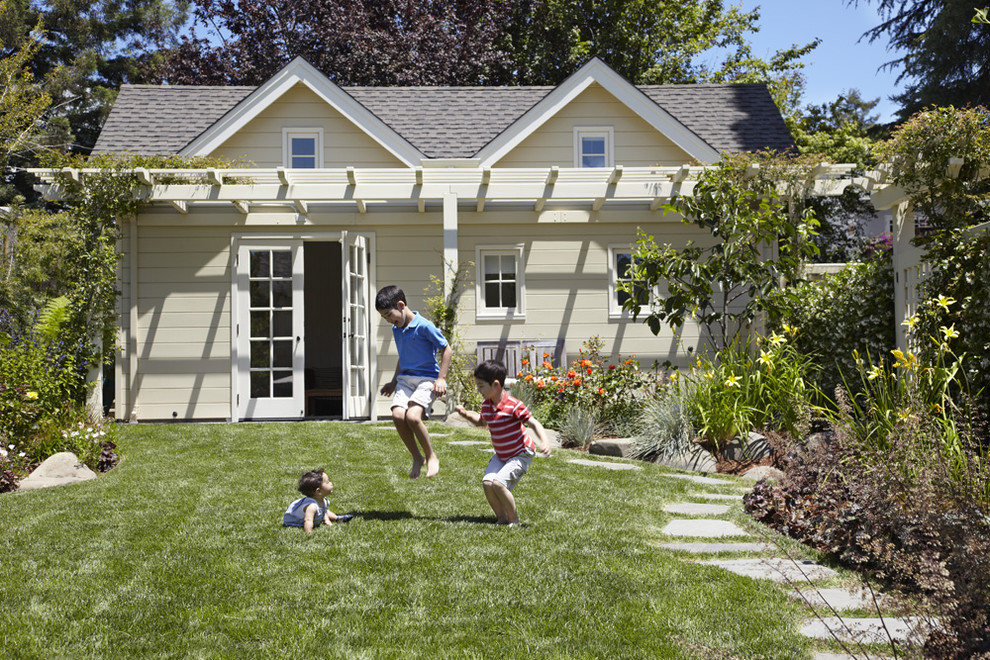 Photo of a small traditional full sun backyard stone landscaping in San Francisco.