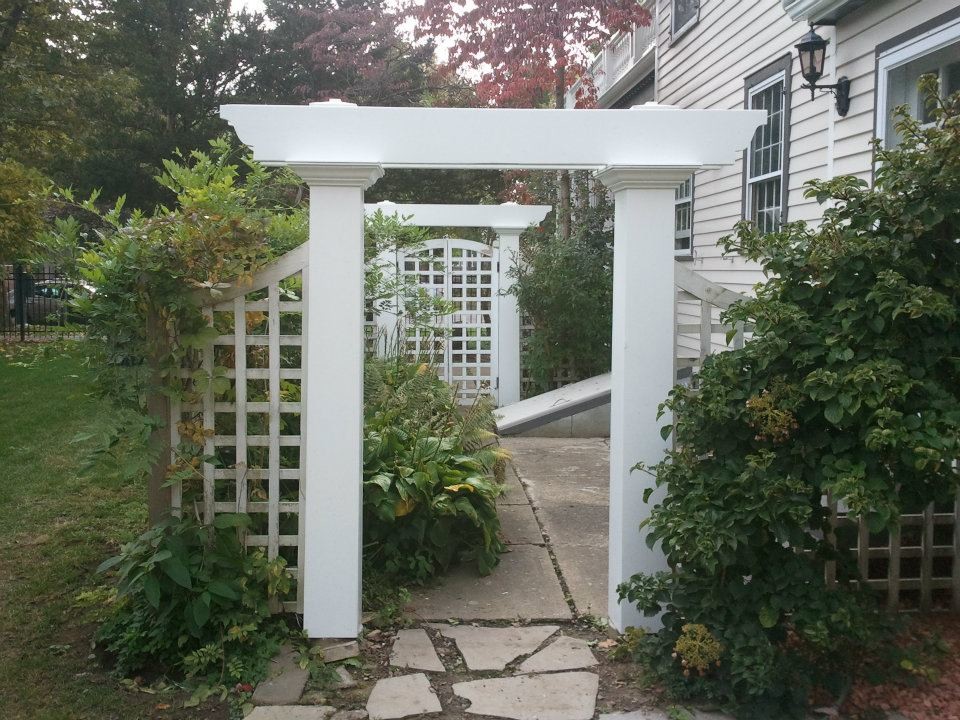 This is an example of a small traditional full sun courtyard formal garden in Toronto.