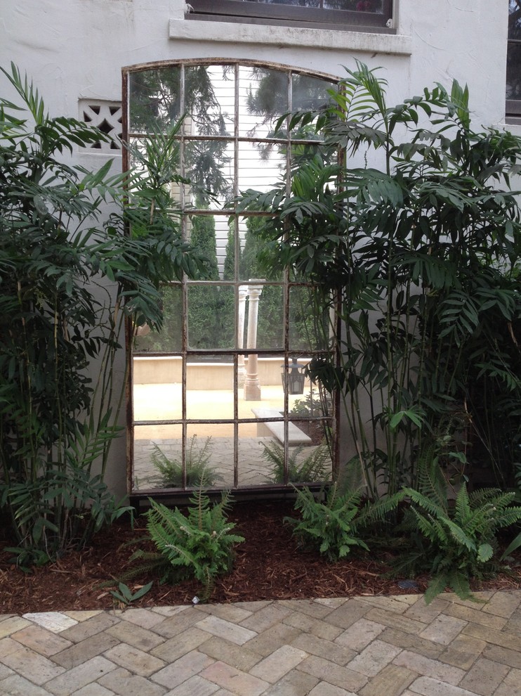 Design ideas for a mid-sized eclectic backyard garden path in San Francisco.