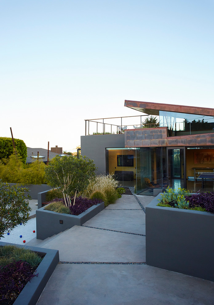 This is an example of a contemporary garden in San Luis Obispo with an outdoor sport court.