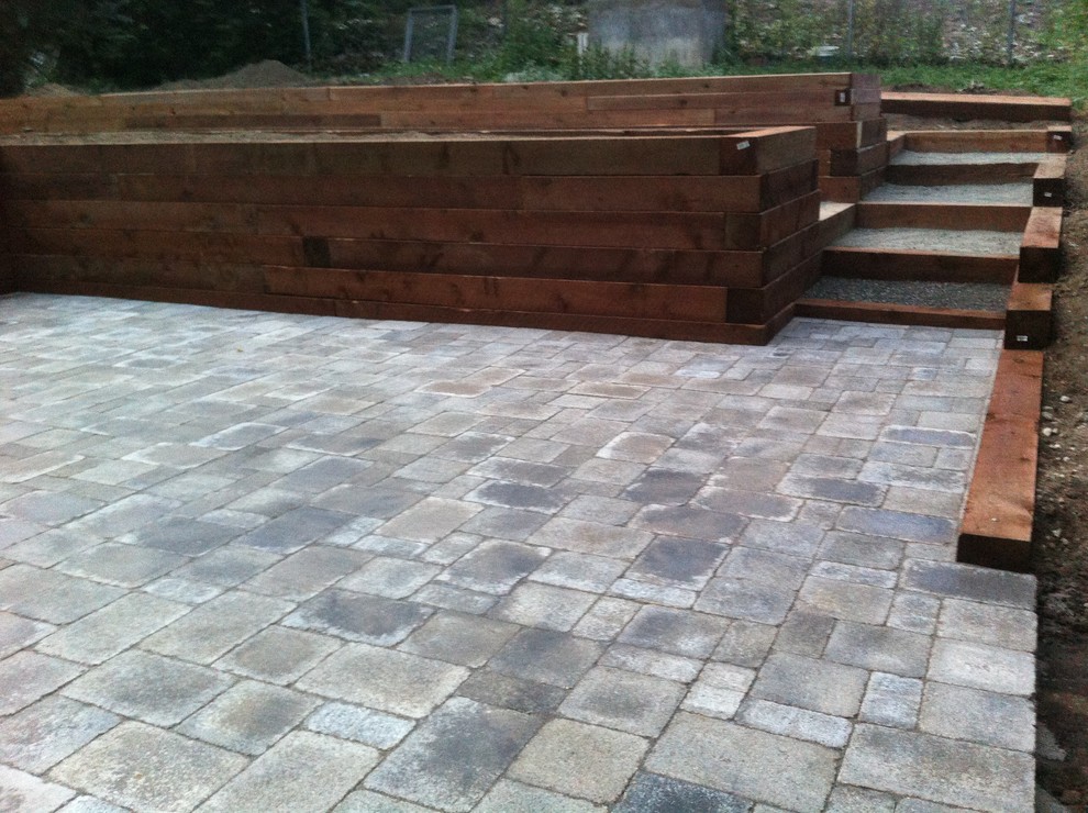 Garden planters over paver patio Traditional Landscape Denver