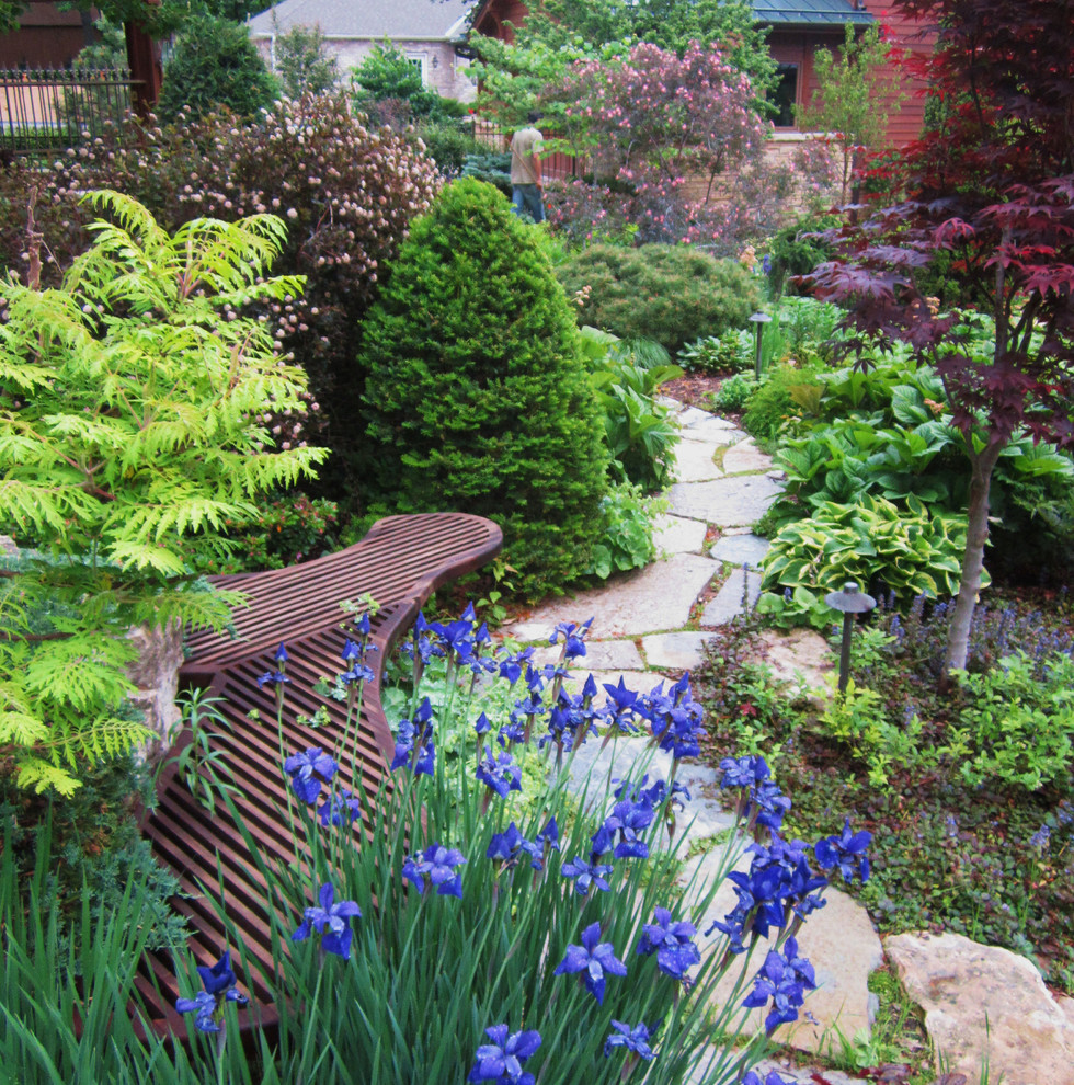 This is an example of a traditional backyard stone landscaping in Minneapolis.
