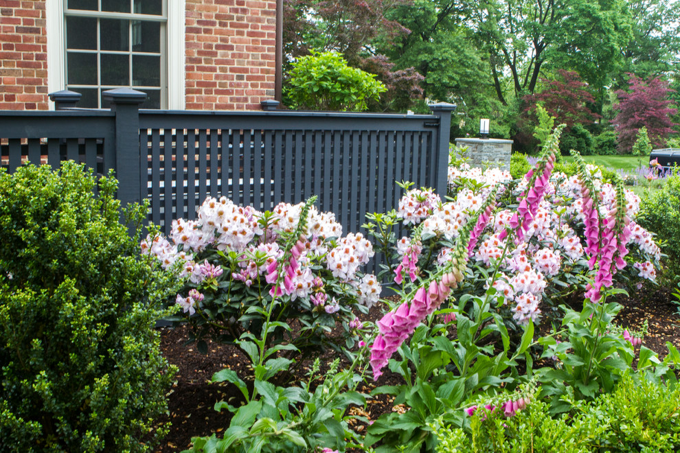 This is an example of a transitional full sun formal garden in New York for spring.