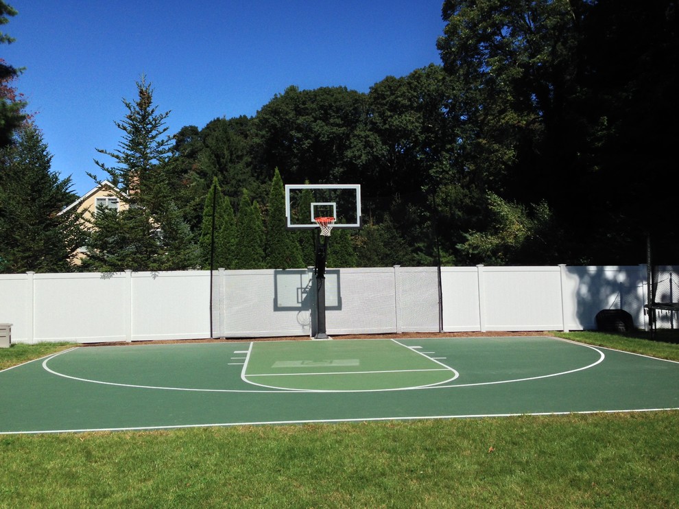 Photo of a large classic back garden in Boston with an outdoor sport court.