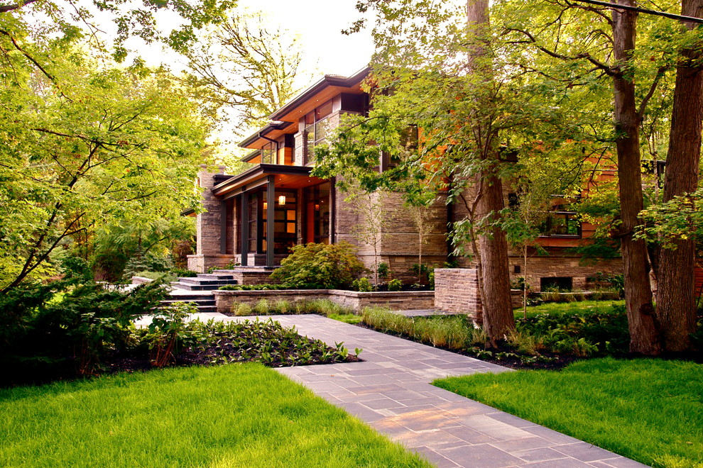 Photo of a contemporary stone landscaping in Toronto.