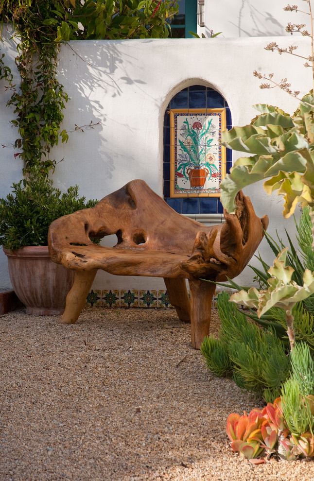 Design ideas for a mediterranean garden in Santa Barbara with gravel.