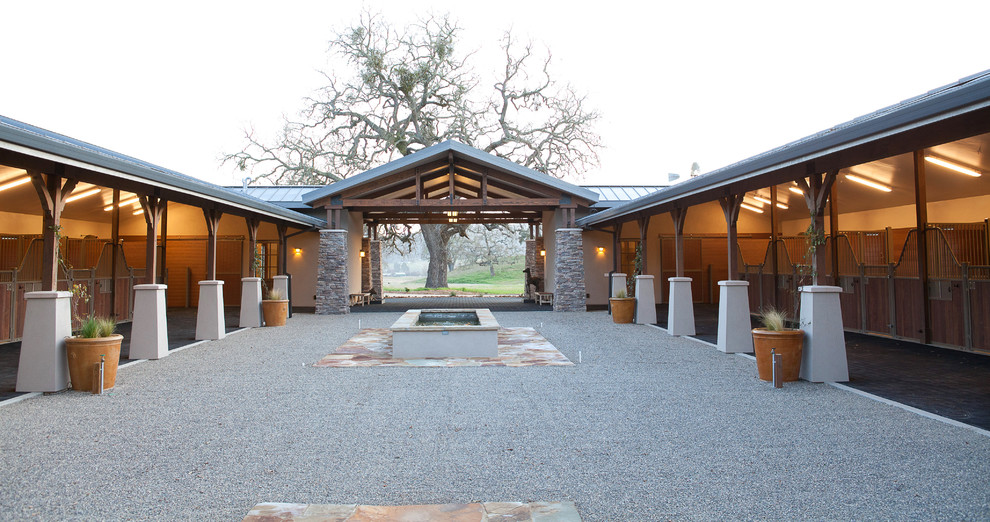 Design ideas for a huge traditional full sun backyard gravel landscaping in San Luis Obispo.