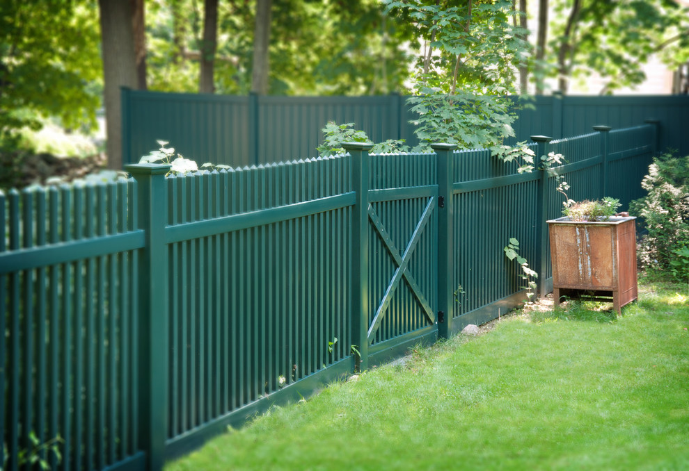 Rustic garden in New York with an upvc fence.