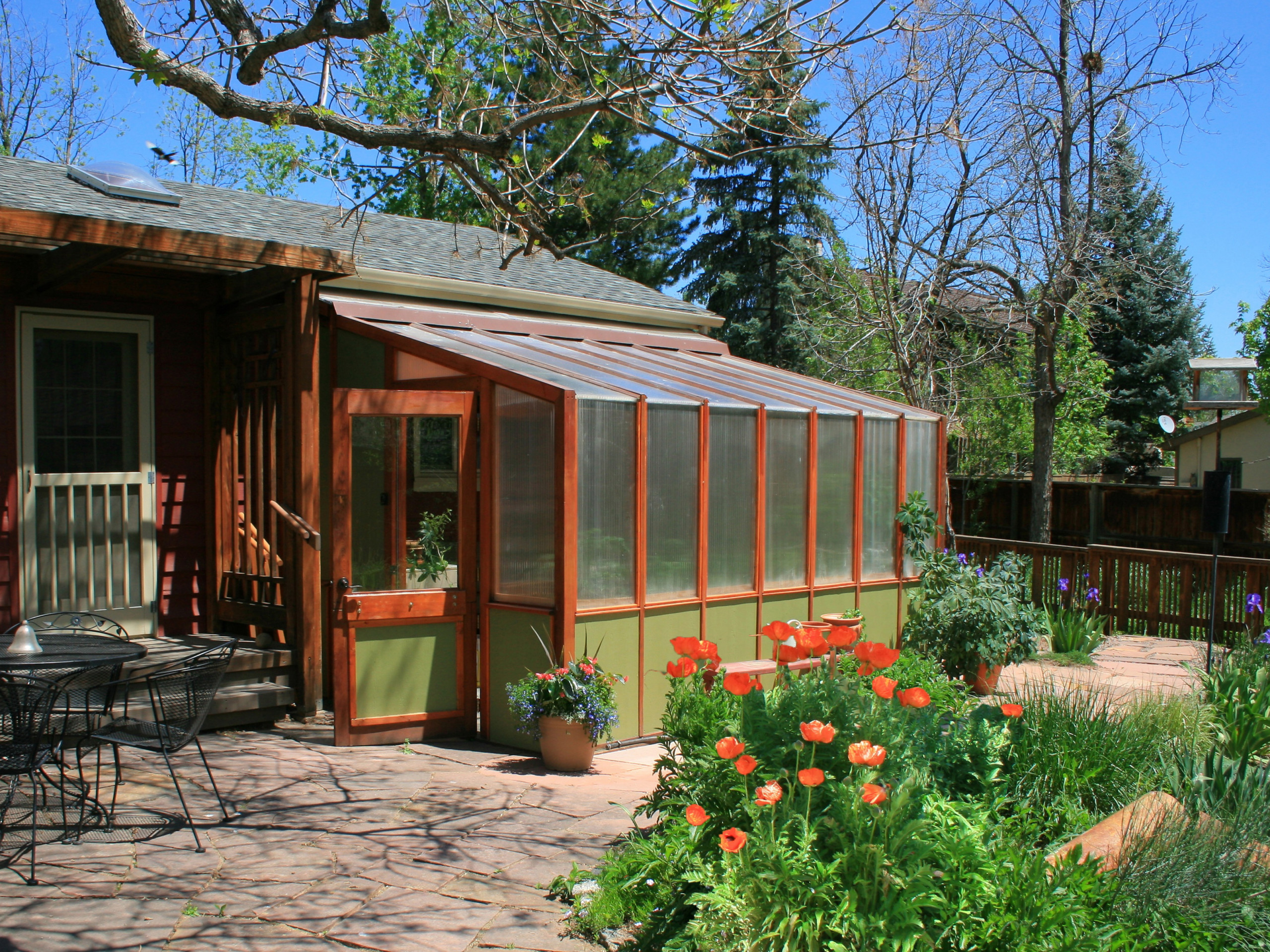 Install a passive solar greenhouse
