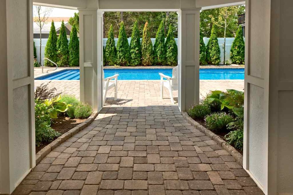 Inspiration for a nautical garden in New York with brick paving.