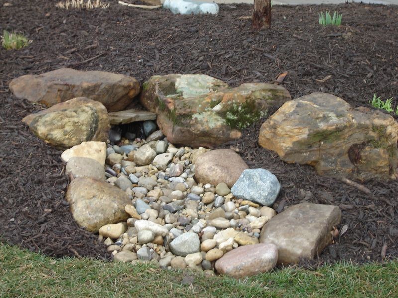 Photo of a small traditional front yard gravel water fountain landscape in Indianapolis for spring.
