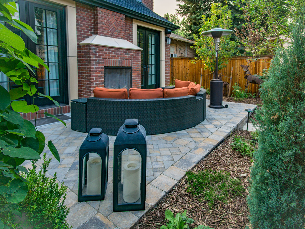 Inspiration for a mid-sized contemporary backyard stone garden path in Denver.