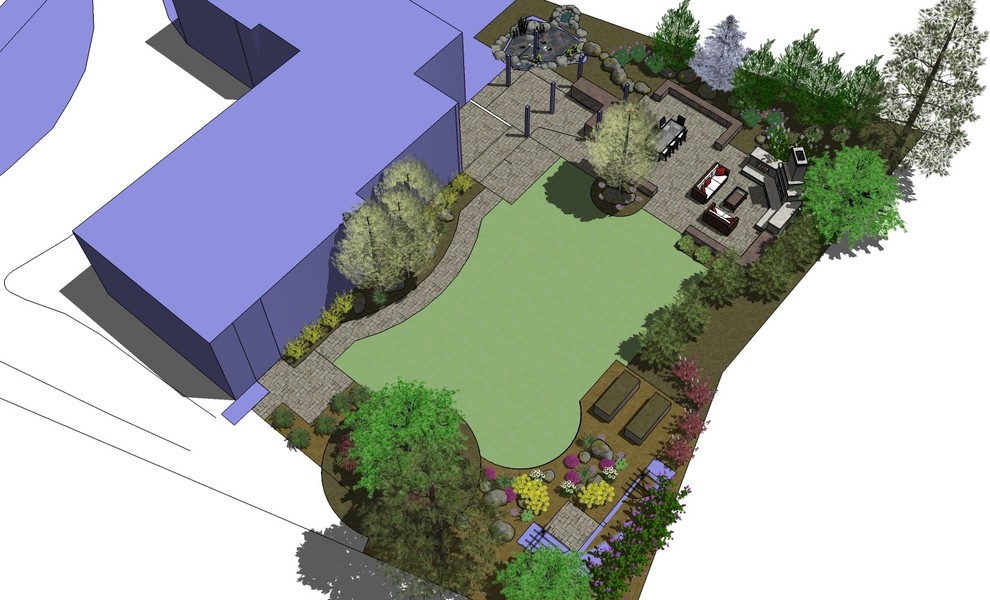 Esempio di un giardino minimalista dietro casa con un focolare e pavimentazioni in cemento