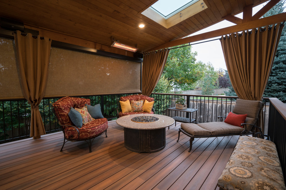This is an example of a medium sized scandi back garden in Denver with decking.
