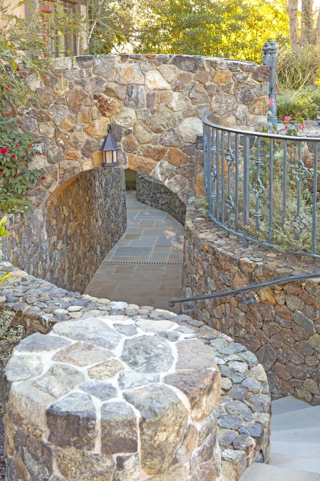 Design ideas for a large mediterranean front full sun garden steps in San Francisco with natural stone paving.