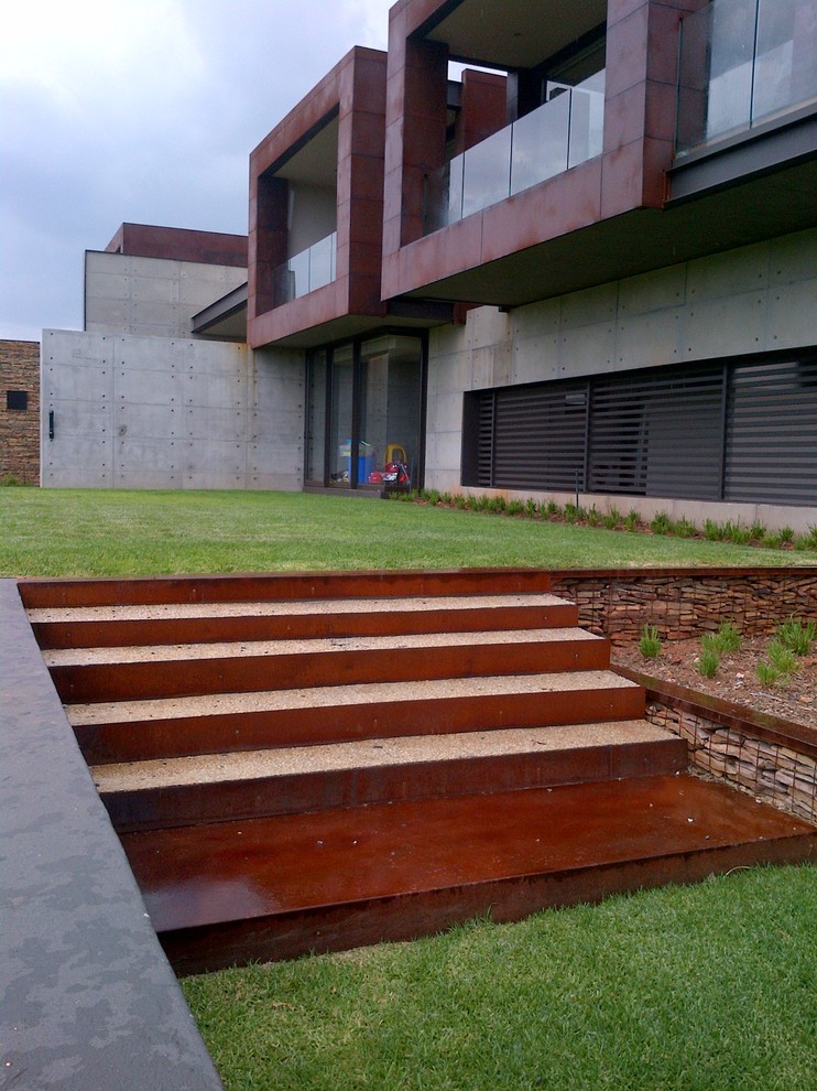 Design ideas for a contemporary sloped garden steps in Other.