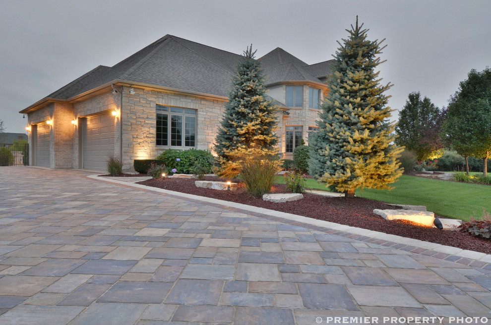 Design ideas for a huge contemporary front yard concrete paver driveway in Chicago.