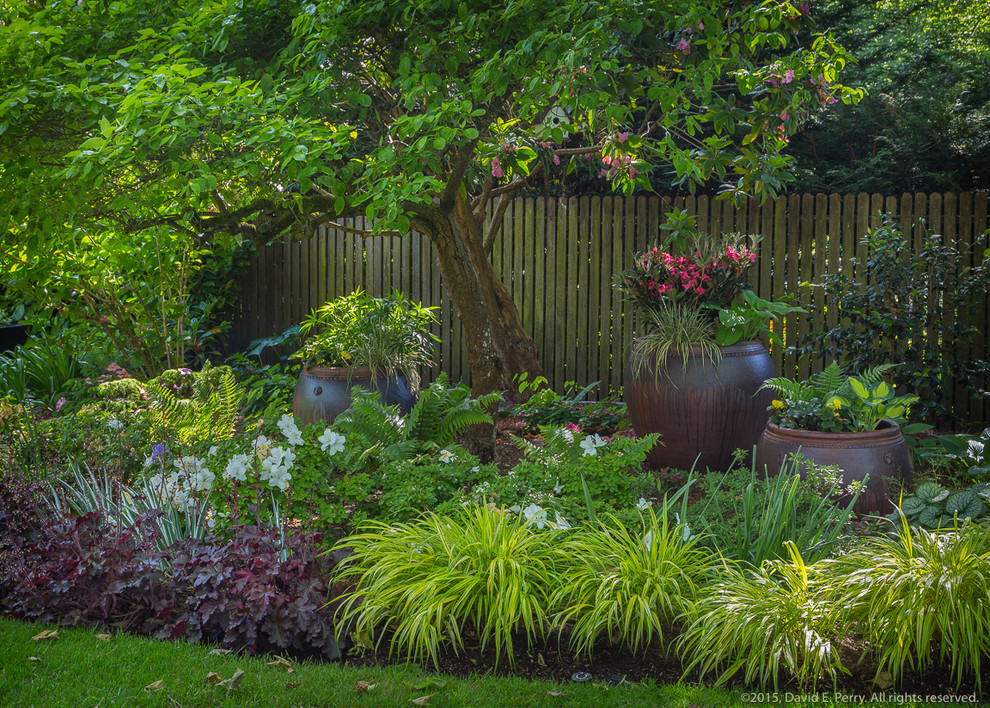 Inspiration for a mid-sized farmhouse backyard landscaping in Seattle.