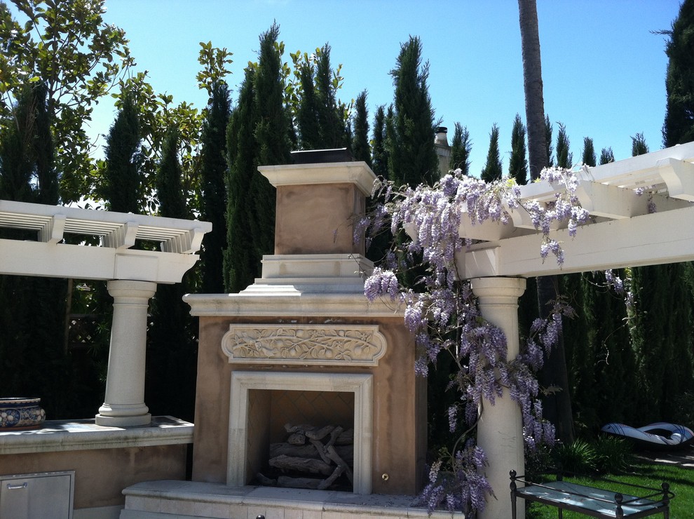 Photo of a small mediterranean full sun side yard stone formal garden in San Francisco with a fire pit for summer.