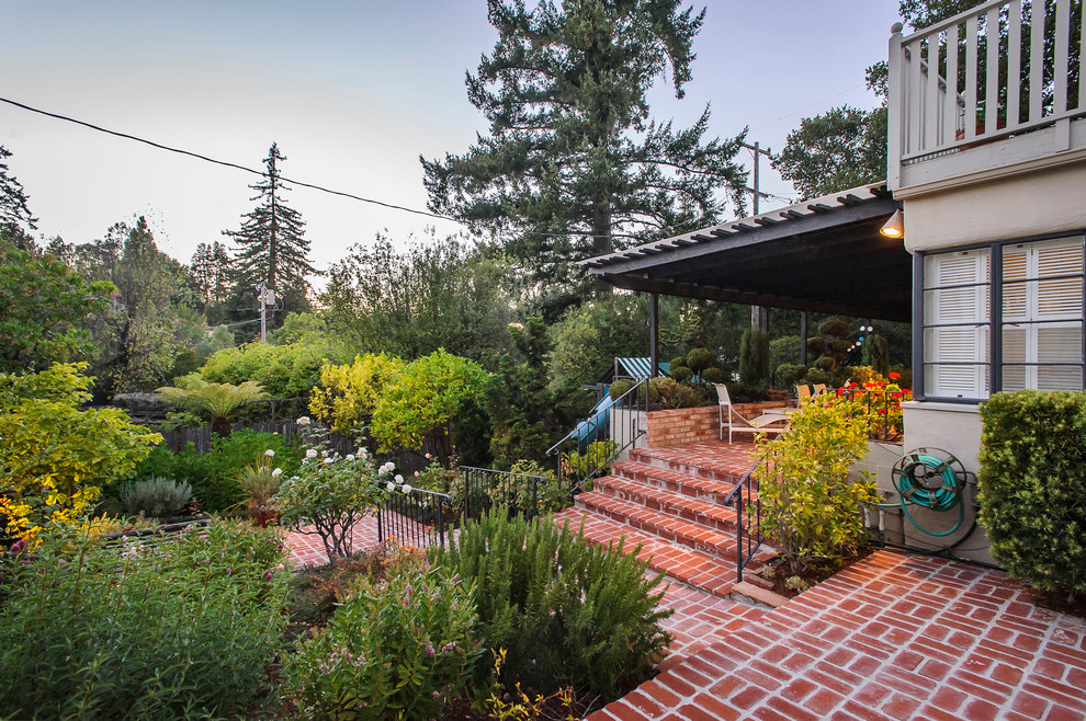 Inspiration for a traditional backyard brick landscaping in San Francisco for fall.