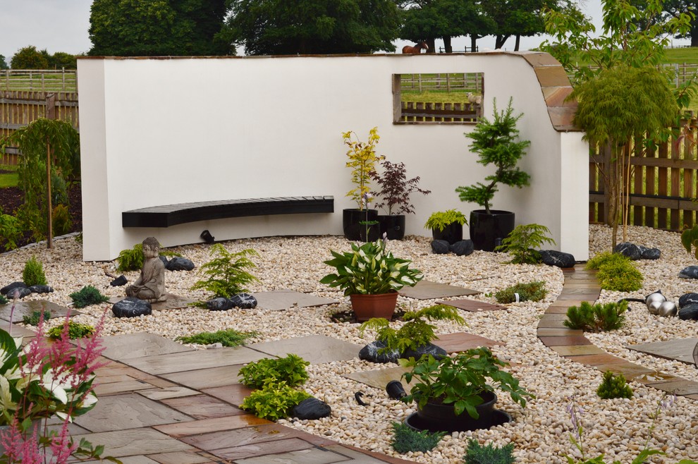 Inspiration pour un jardin asiatique de taille moyenne avec une exposition ombragée et du gravier.