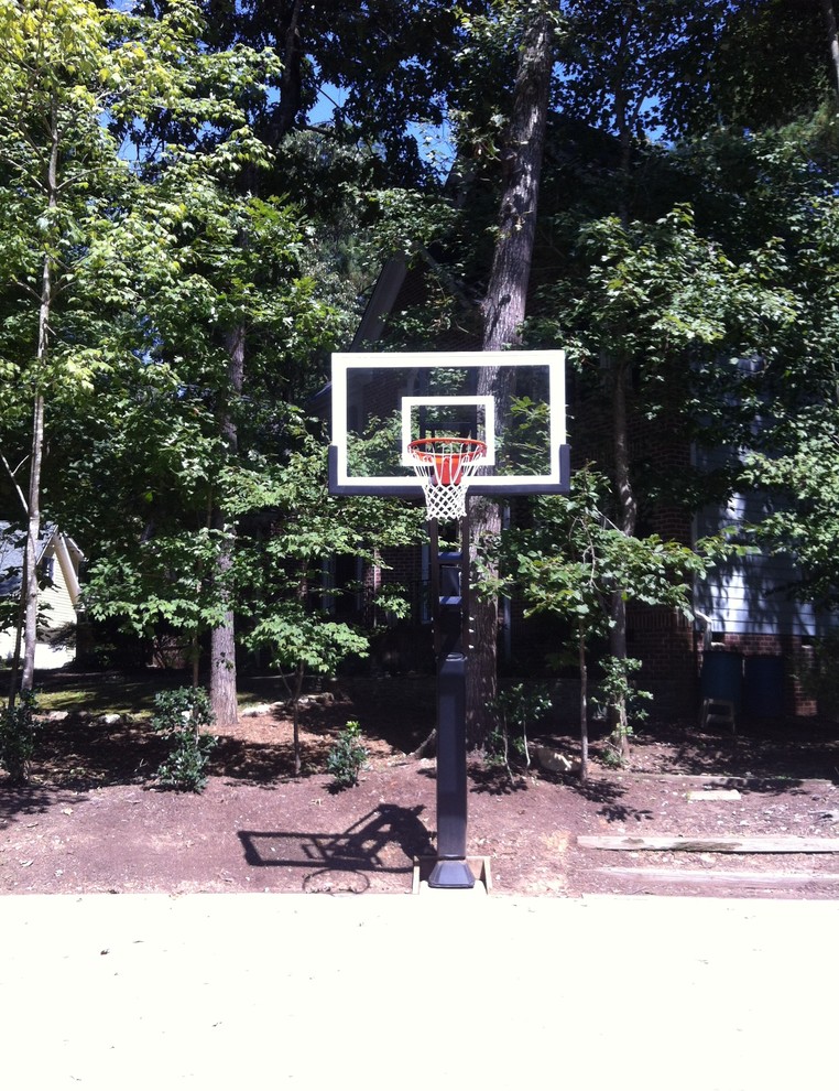 Design ideas for a large traditional partial sun backyard outdoor sport court in Raleigh.