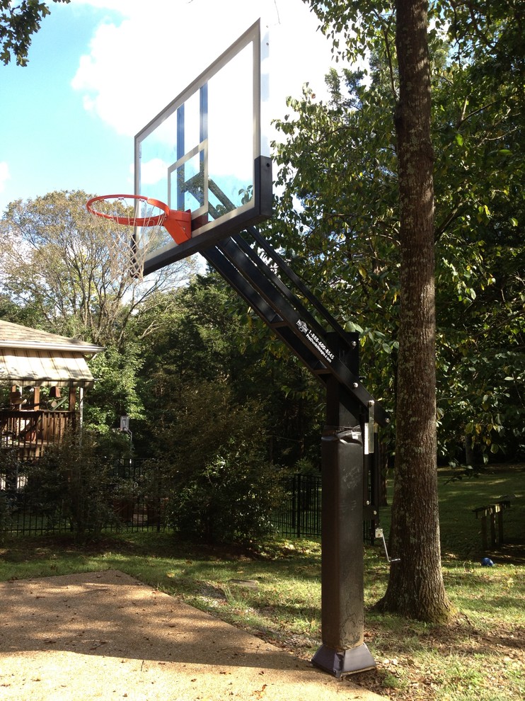 Photo of a large traditional partial sun front yard outdoor sport court in Nashville.