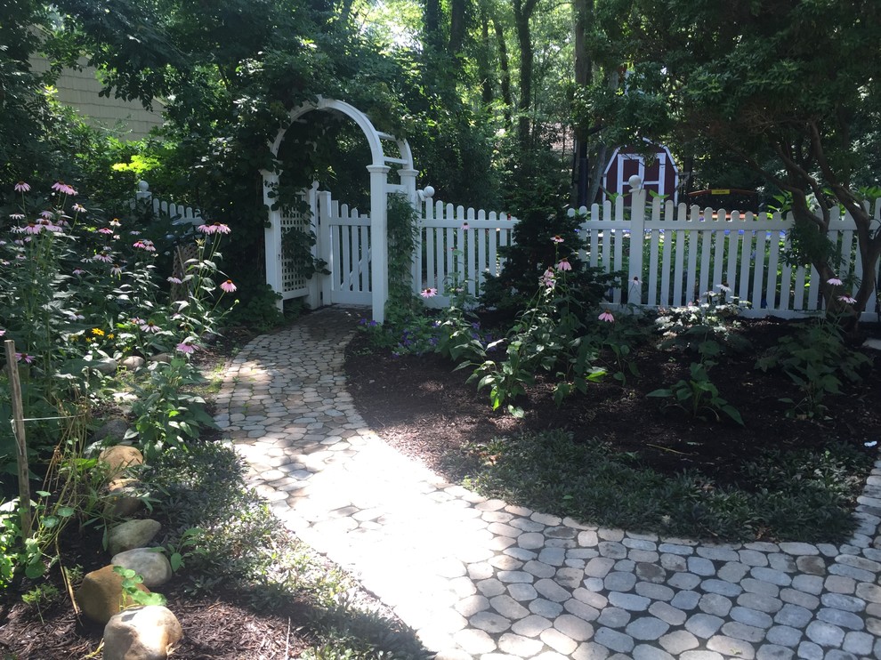 Design ideas for a classic back garden in New York with a garden path.
